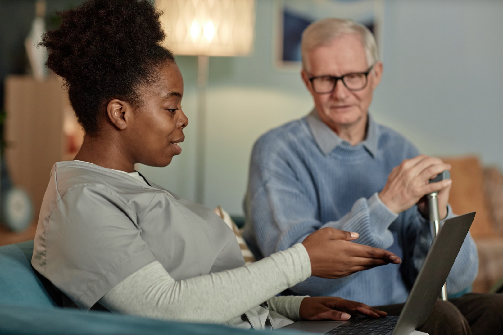 source_black-female-social-worker-assisting-senior-man-wi-2025-03-08-11-29-14-utc